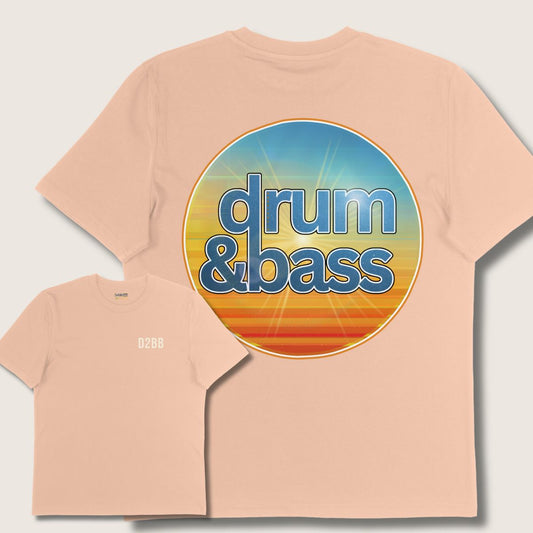Beige t-shirt with 'drum & bass' graphic on a light gray background
