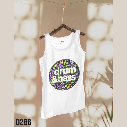 White tank top with 'drum & bass' design on a hanger against a blurred natural background