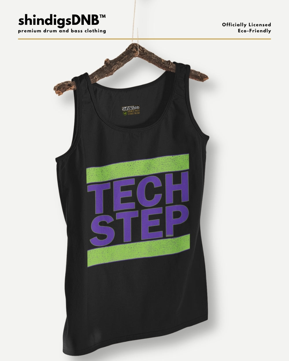 A black tank top hanging on a wooden hanger against a light gray background. The tank top features a graphic with the words 'TECH STEP' in purple text between two horizontal lime green stripes.