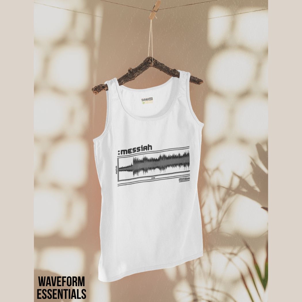 White tank top with graphic design on a hanger against a blurred natural background, drum and bass
