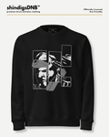 A black crewneck sweatshirt with a white and gray graphic print of a stylized face and geometric shapes on the front, displayed on a light gray background with branding text at the top.