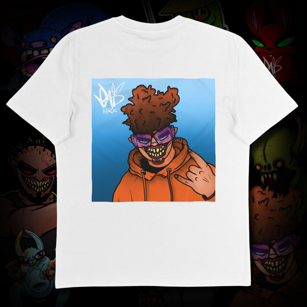 White t-shirt with a graphic of a person in an orange hoodie and sunglasses on a dark background.