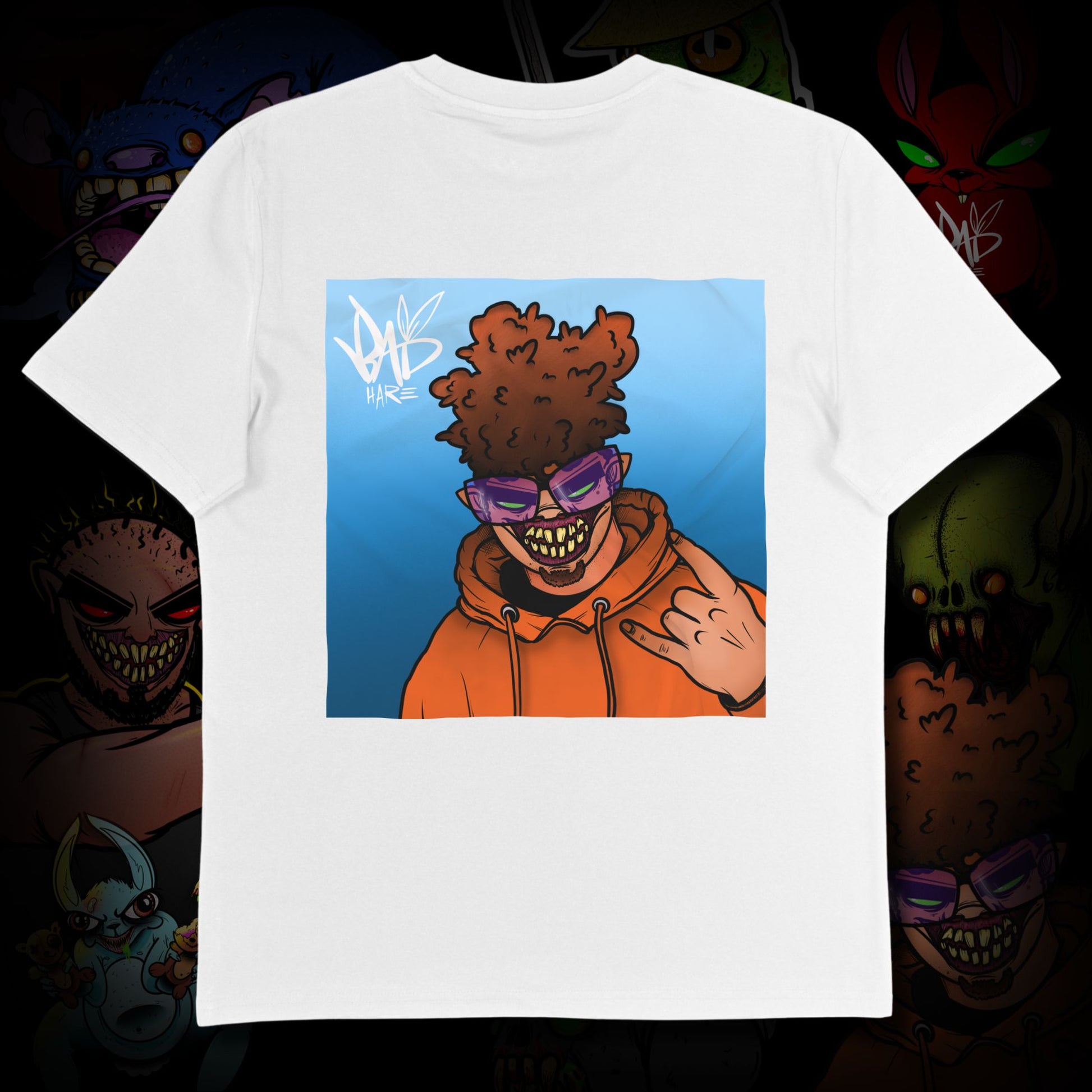 White t-shirt with a graphic of a person in an orange hoodie and sunglasses on a dark background.