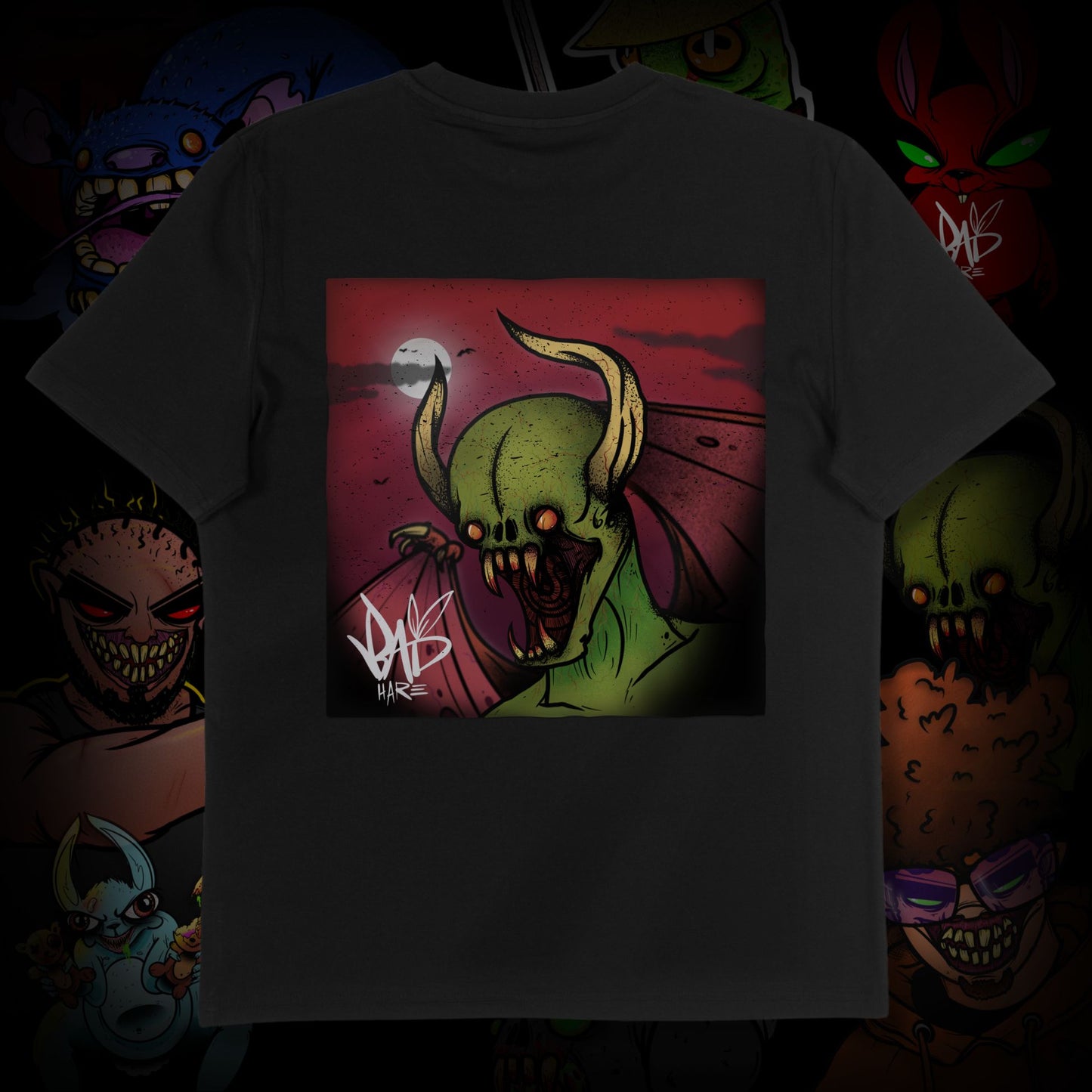 T-shirt with a graphic design of a green creature with horns on a dark background