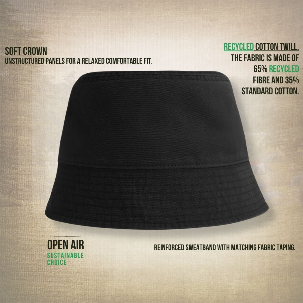 Black bucket hat with sustainability information on a beige background