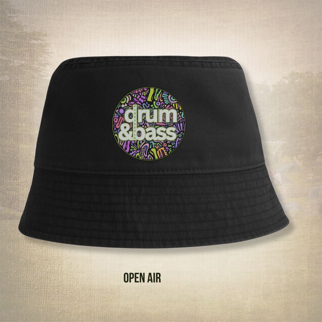 Black bucket hat with colorful 'drum & bass' logo on a beige background