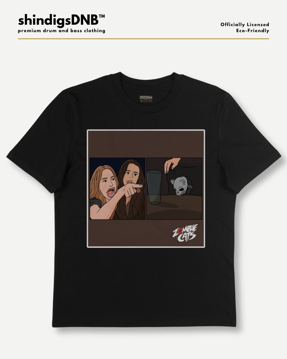 A black short-sleeve t-shirt with a square graphic print on the front, featuring an illustration of two women and a zombie, with the text 'Zombie Girls' in a stylized font. The shirt is displayed flat against a light gray background with branding text for 'shindigsDNB' at the top.