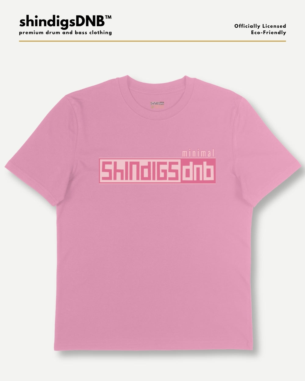 A pink short-sleeve t-shirt with a pink graphic print on the chest reading 'shindigsdnb' and 'minimal', displayed on a light gray background with brand text at the top.