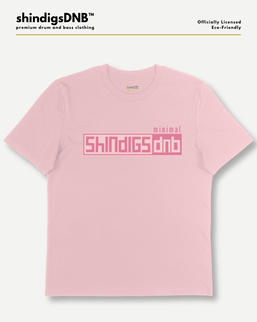 A light pink short-sleeve t-shirt with a pink graphic print on the chest reading 'minimal SHINDIGSDNB'. The image is presented on a light gray background with branding text at the top left reading 'shindigsDNB' and text at the top right reading 'Officially Licensed Eco-friendly'.
