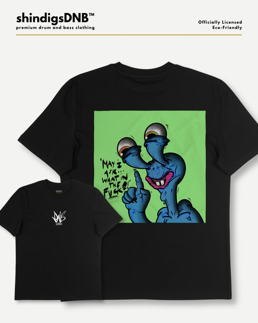 Black short-sleeve graphic t-shirt shown in two views: a large front view featuring a green square with a blue cartoon character, and a smaller back view showing a small white logo on the left chest. The brand name 'shindigsDNB' is visible at the top.